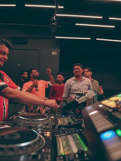 Sharing a smile with the front row. These small interactions are a huge part of building a connection during a long set.
