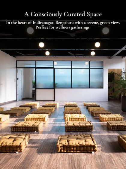 As a consciously curated space, Uruvana offers a serene, green view that feels like an escape from the city. This setup with floor cushions is ideal for meditation sessions, sharing circles, and other wellness gatherings where connection and grounding are key.