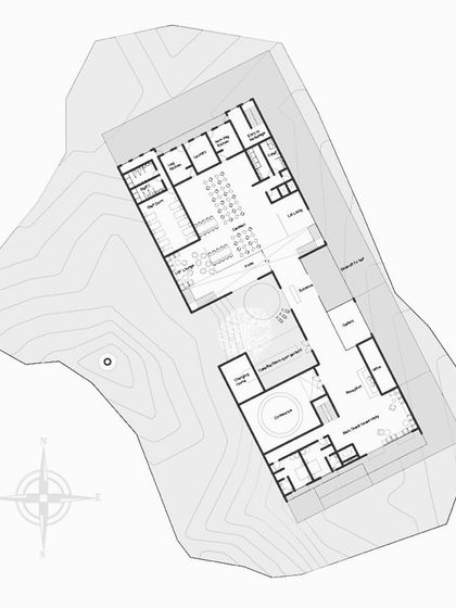 The floor plan for the community hall. The layout separates public gathering spaces from the private guest house areas, with the courtyard acting as a functional and social hub connecting the two.