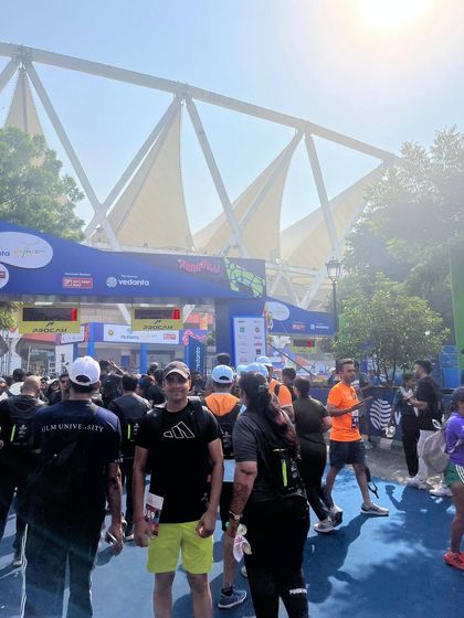 The atmosphere at Jawaharlal Nehru Stadium during the Delhi Half Marathon is electric.