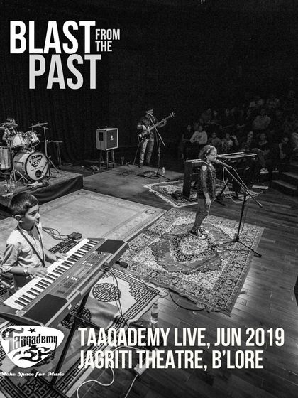 A blast from the past from our Taaqademy Live show in 2019. This black and white shot from Jagriti Theatre shows our students owning the stage, a goal we work towards in every camp.