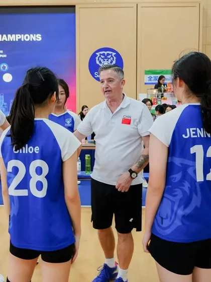 Respect for the competition. A look at one of the strong local Shanghai teams we faced, seen here in a huddle with their coach.