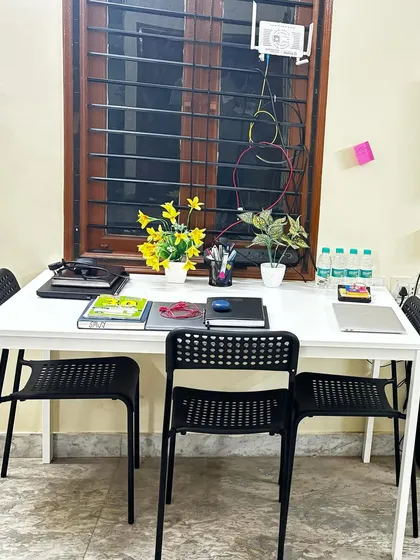 A close-up of a shared desk at the Bangalore office, ready for the team to start working. This series shows our hands-on approach to expansion.