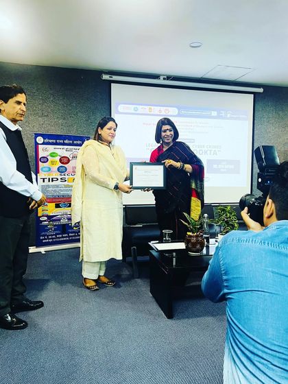 Receiving a certificate after a Legal Awareness Program on Cyber Jagrookta (Cyber Awareness).