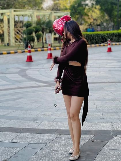 My Valentine's Day look. I skipped the traditional red for this chic brown cut-out dress, perfect for a modern romantic celebration.