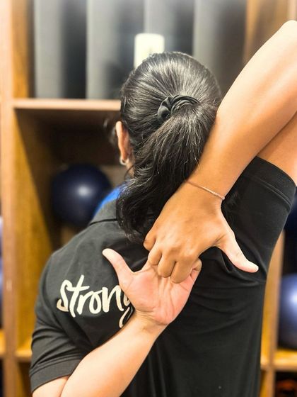 A good stretch is essential for recovery and flexibility. This triceps stretch helps to release tension in the arms and shoulders after a sculpting workout.