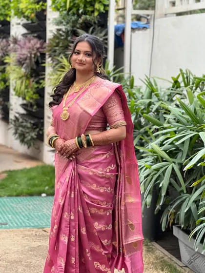 My bride Shruti looking lovely for her engagement in a pink silk saree.
