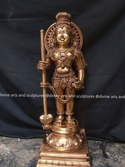 Another view of the Udupi Krishna statue, highlighting the distinctive staff and the serene, childlike expression that is characteristic of this beloved deity.