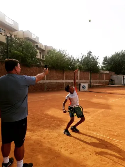 Another angle of the serve speed test. We use these tools to provide immediate, objective feedback, helping players understand the connection between their technique and the ball's velocity.