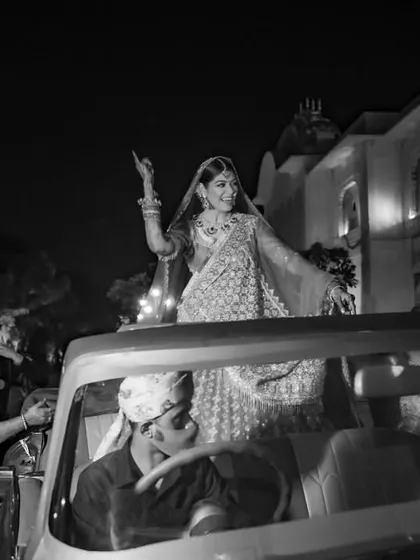 A timeless black and white shot of the bride's grand entry. It captures the elegance and cinematic quality I aim to bring to every wedding.