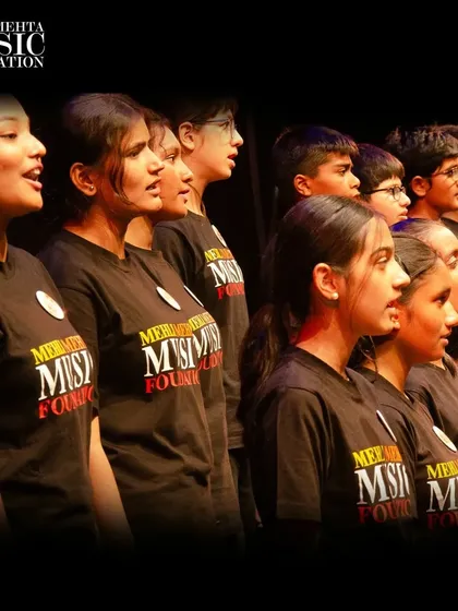 A close-up of our youth choir singers, their expressions filled with passion and concentration as they perform.