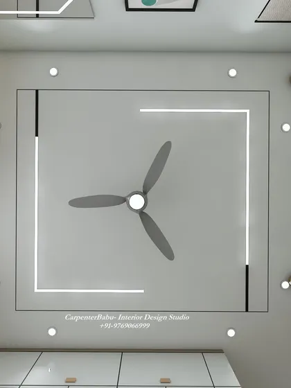A minimalist false ceiling design in a bedroom, with clean lines and integrated spot lights.
