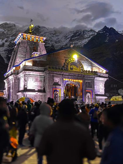 The bustling crowd of devotees at Kedarnath Temple at night, capturing the collective energy and faith of the pilgrims.
