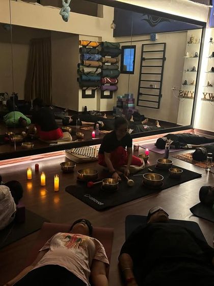 Another view of our Naada Yoga world. The large mirror reflects the calm energy of the room as students settle in for their journey into sound and stillness.