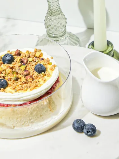 Our new Lemon Berry Tres Leches, a light and airy cake soaked in three milks and topped with lemon cream and fresh blueberries.