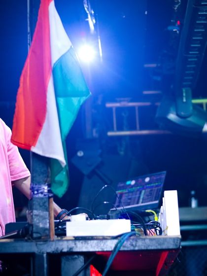 Pointing to the crowd, sharing the patriotic energy during a Republic Day themed club night.