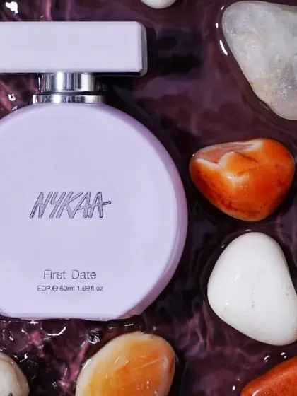 For this Nykaa perfume, I created a scene with rippling water and stones to evoke a natural and fresh feeling. This type of creative product styling is perfect for social media and digital ads.