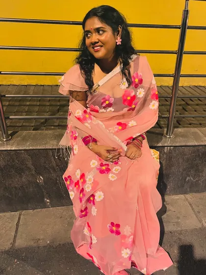 Feeling festive in a floral saree. This look is perfect for a daytime Mehendi or a vibrant Sangeet party.