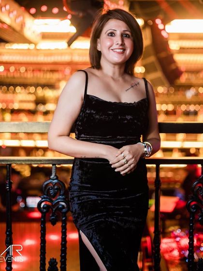 A guest posing on the balcony.