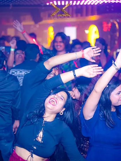 Friends dancing together and making memories in Bhubaneswar.