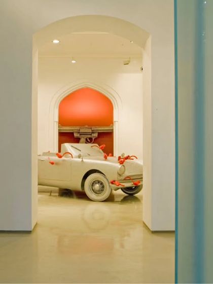 An art installation viewed through a series of thresholds at the Sakshi Art Gallery. The design creates framed views and a sense of procession, enhancing the experience of discovering the art within the space.