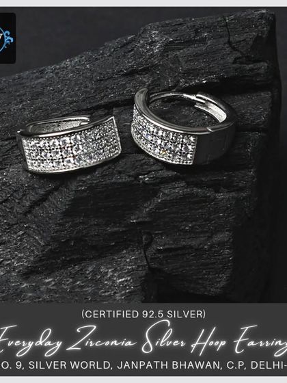 A wider version of our everyday zirconia hoop earrings, offering more surface area for extra sparkle. These are perfect for kids and adults alike.