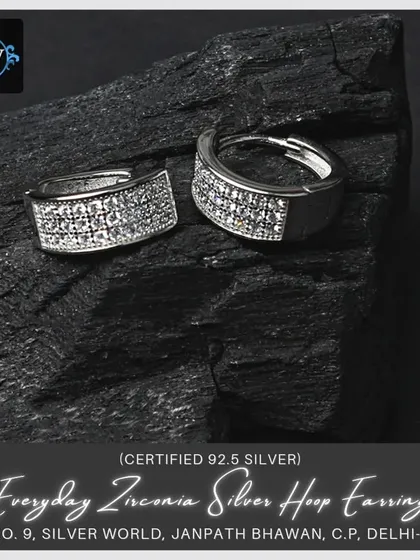 A wider version of our everyday zirconia hoop earrings, offering more surface area for extra sparkle. These are perfect for kids and adults alike.