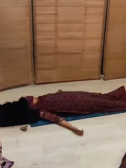 A participant in a state of deep rest during the lucid healing portion of the workshop. This practice is designed to cleanse the aura, release trauma, and deeply rejuvenate your entire system.