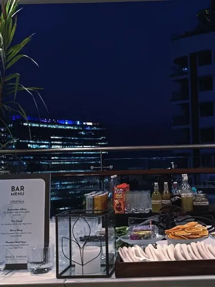 This is a sleek mobile bar I set up for a corporate event on a rooftop. The setup includes my professional bartenders, a full range of spirits, and custom printed menus to give your event a polished feel.