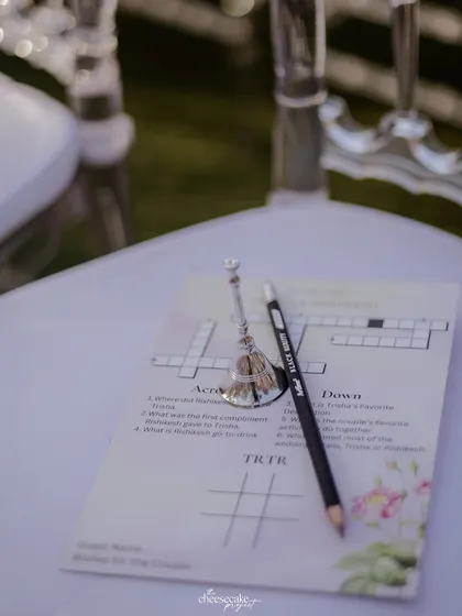 It's all in the details! I loved this personalized crossword puzzle and bell for guests to enjoy.