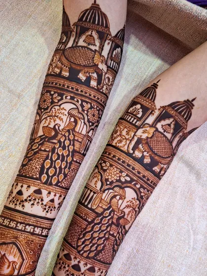 A close-up of a forearm design without human figures, showcasing beautiful peacocks and intricate patterns. The use of bold lines and delicate details creates a captivating effect.