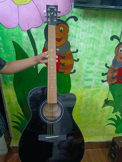 A new Yamaha FS80C black acoustic guitar added to our class. We believe a good quality instrument enhances the learning experience.