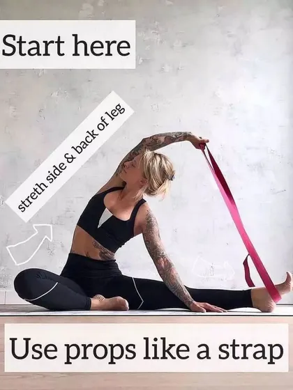 If you can't reach your foot in a side stretch, use a prop like a strap. This image shows how a strap can help you maintain good form and get a deep stretch in the side body and hamstrings without compromising alignment.