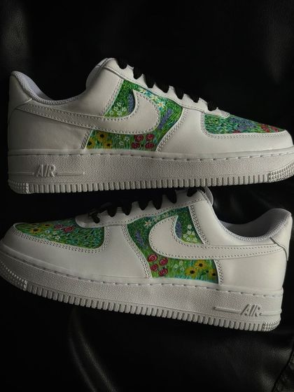 A top-down view of the colorful flower field custom sneakers.