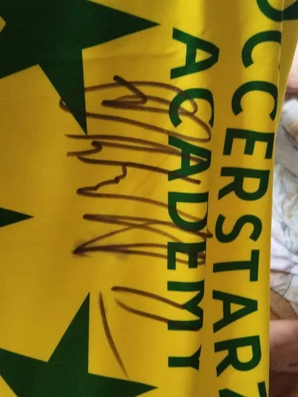 A close-up of Sunil Chhetri's signature on our jersey. This autograph represents a connection to greatness for our young, aspiring footballers.