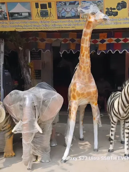 These are some of my life-sized animal props, perfect for a jungle or safari themed party. Here you can see the quality of the tiger, elephant, giraffe, and zebra statues that I personally deliver and set up for your event.