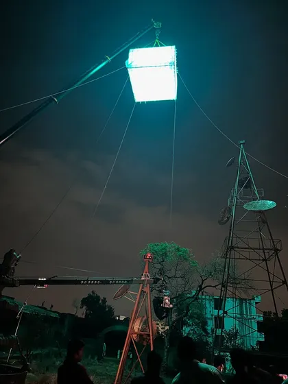 The moonbox rig for 'Kishkindhapuri' seen from a distance, showing its position relative to the set and other equipment like the camera crane.
