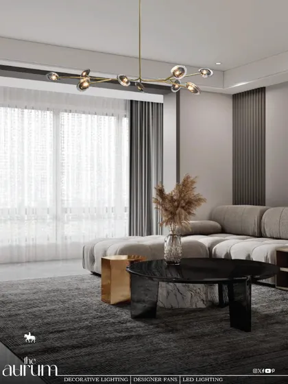 This linear, multi-bulb pendant introduces a sleek, contemporary element to a minimalist living room. Its design provides excellent light distribution over the seating area while maintaining a feeling of open, uncluttered elegance.