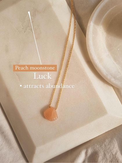 The Peach Moonstone shell pendant, a beautiful piece for luck and abundance.