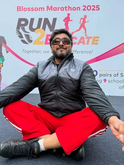 A moment of calm before the storm of energy at the "Run 2 Educate" Blossom Marathon. It's important to be centered before leading thousands of people.
