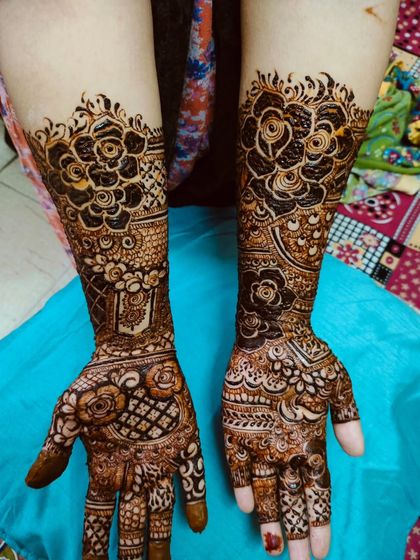 A full view of this semi-bridal design, showing how the pattern extends up the arm in a graceful way.