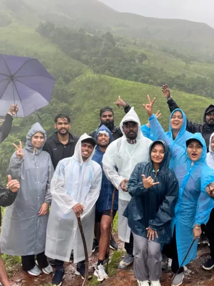 A candid group shot in the rain. We encourage everyone to embrace the elements and have fun, no matter the weather.