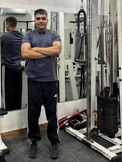 Another arms-crossed pose.