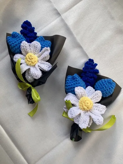 Two adorable mini bouquets in shades of blue and white. They feature a mix of tulips, lavender, and a daisy, perfect for a small but thoughtful gesture.