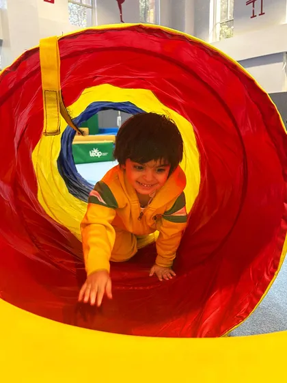 This is what pure joy looks like. We believe in creating a space where even our tiniest members can explore, play, and discover the fun in movement, building confidence from their very first crawl through the tunnel.