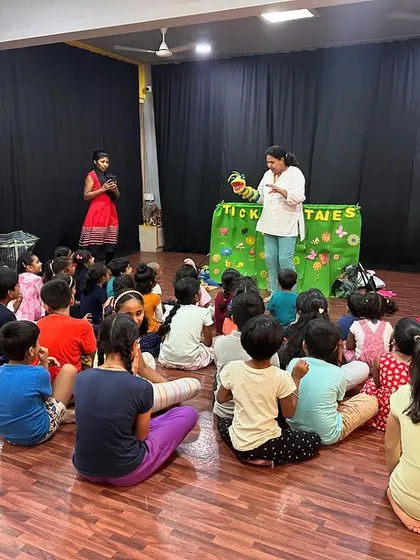 An interactive moment during a puppet show. I always make time for the puppets to "talk" with the children, making the experience more personal and magical.