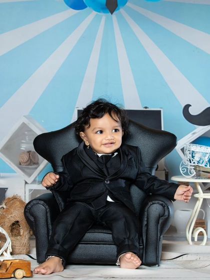 Another shot of our dapper little boss, looking confident and cheerful.