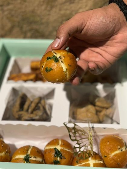 A peek at my Savoury and Sweet Box, featuring one of the mouth-watering Korean Cream Cheese Buns.