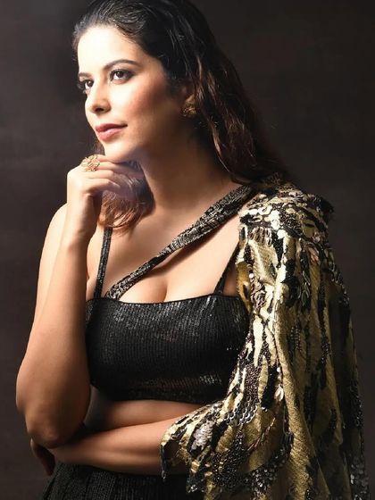 For this Indian wedding couture shoot, I styled a shimmering black and gold lehenga set. The focus was on creating a glamorous and modern look for a bridesmaid or wedding guest, blending sequins with contemporary silhouettes.