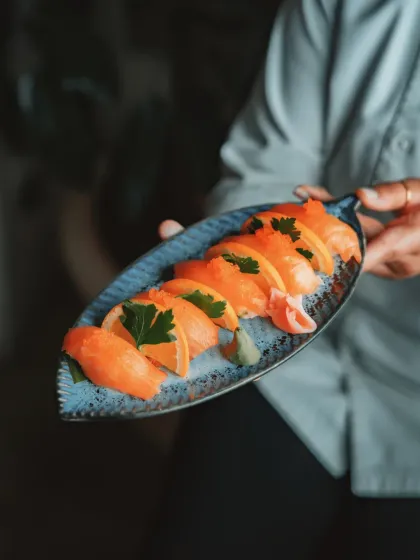 A plate of our Salmon Nigiri, a testament to the beauty of fresh, high-quality ingredients and classic technique.